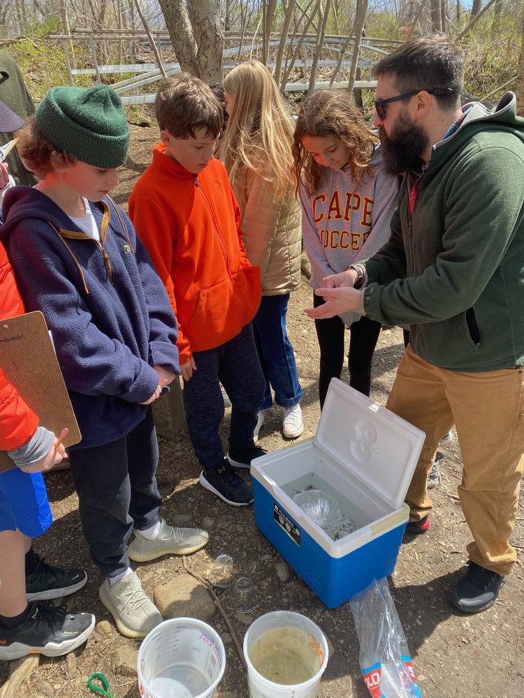 Mr. Chase prepping students for the trout release. 
