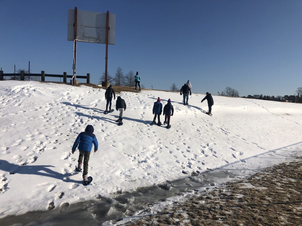 5th grade students snowshoeing